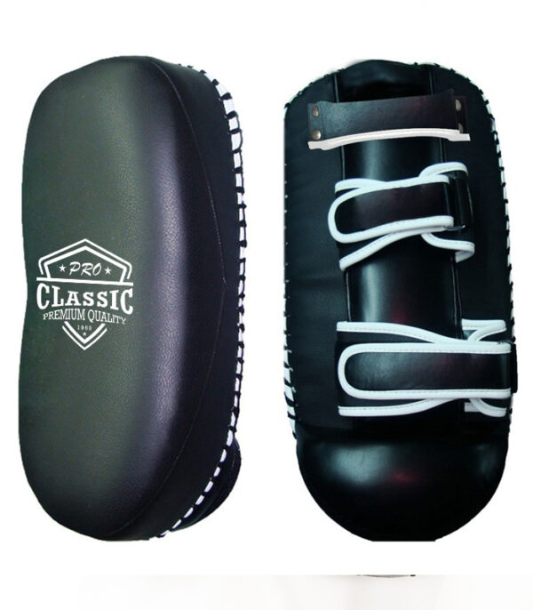 High-quality kicking shields and Thai kick pads manufactured in Pakistan, designed for martial arts, MMA, and Muay Thai training.