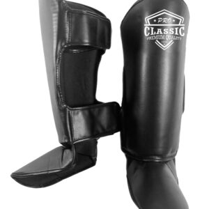 Professional Muay Thai shin guards with reinforced padding for maximum impact resistance