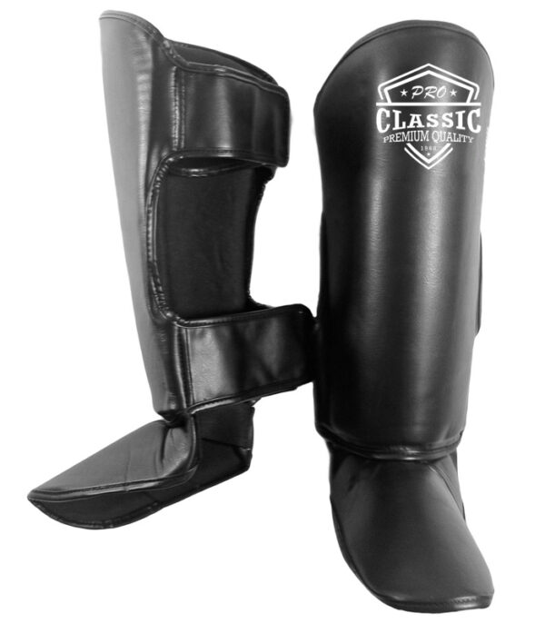 Professional Muay Thai shin guards with reinforced padding for maximum impact resistance